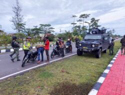 Kodim 1715/Yahukimo, Polres Yahukimo dan Satgas Yonif 6 Marinir Gelar Patroli Bersama di Wilayah Kota Dekai